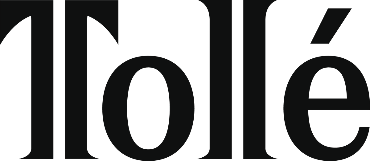 The wordmark 'Tollé' in a bold black serif typeface on a plain white background.